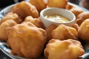 Museos y Arte en Colombia 401 Receta de Buñuelos: una delicia colombiana de delicia crujiente y dulce indulgencia